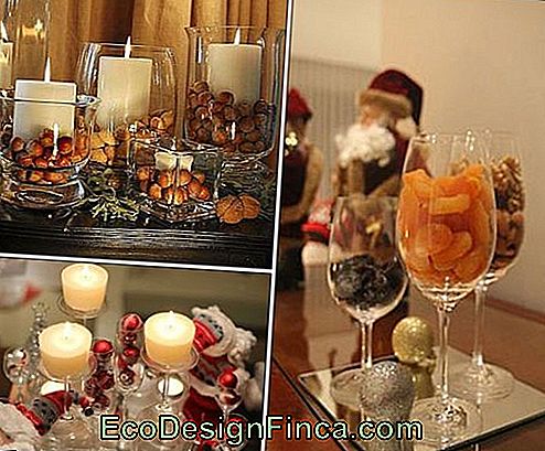 Świąteczny stół ozdobiony owocami i orzechami