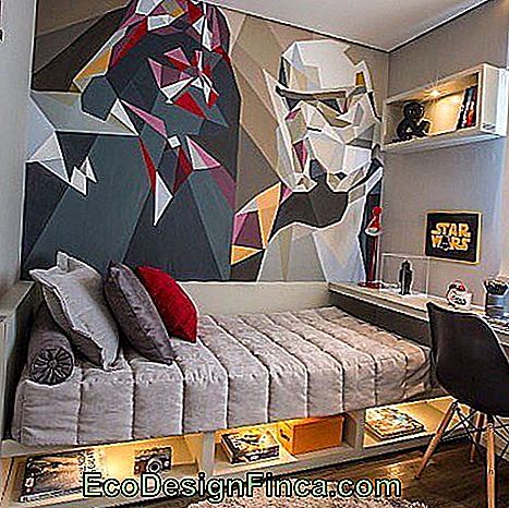 Male bedroom with blue, red and gray accents.