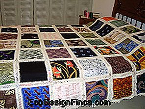 quilt with white crochet