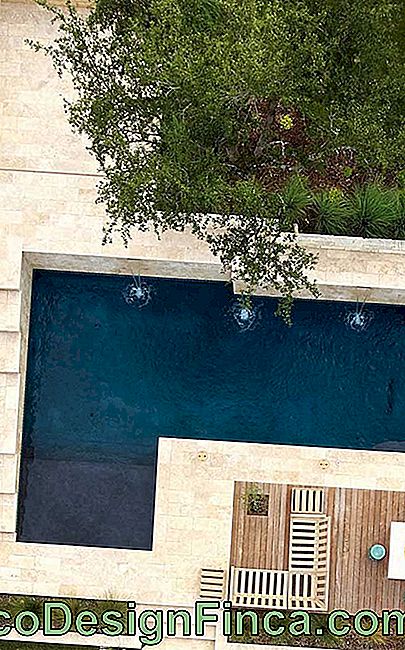 Top view of the pool area of ​​the house with stone flooring São Tomé